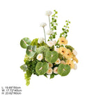 Colorful table flowers placed on white linen tablecloth