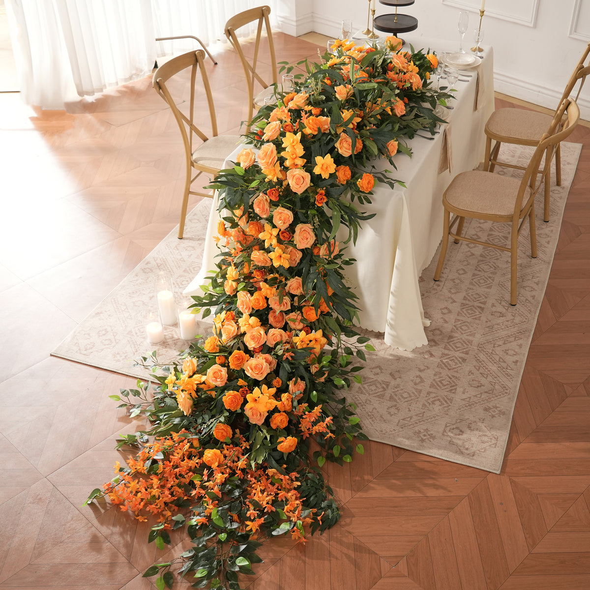 Cascading greenery flower tail for sweetheart table decor