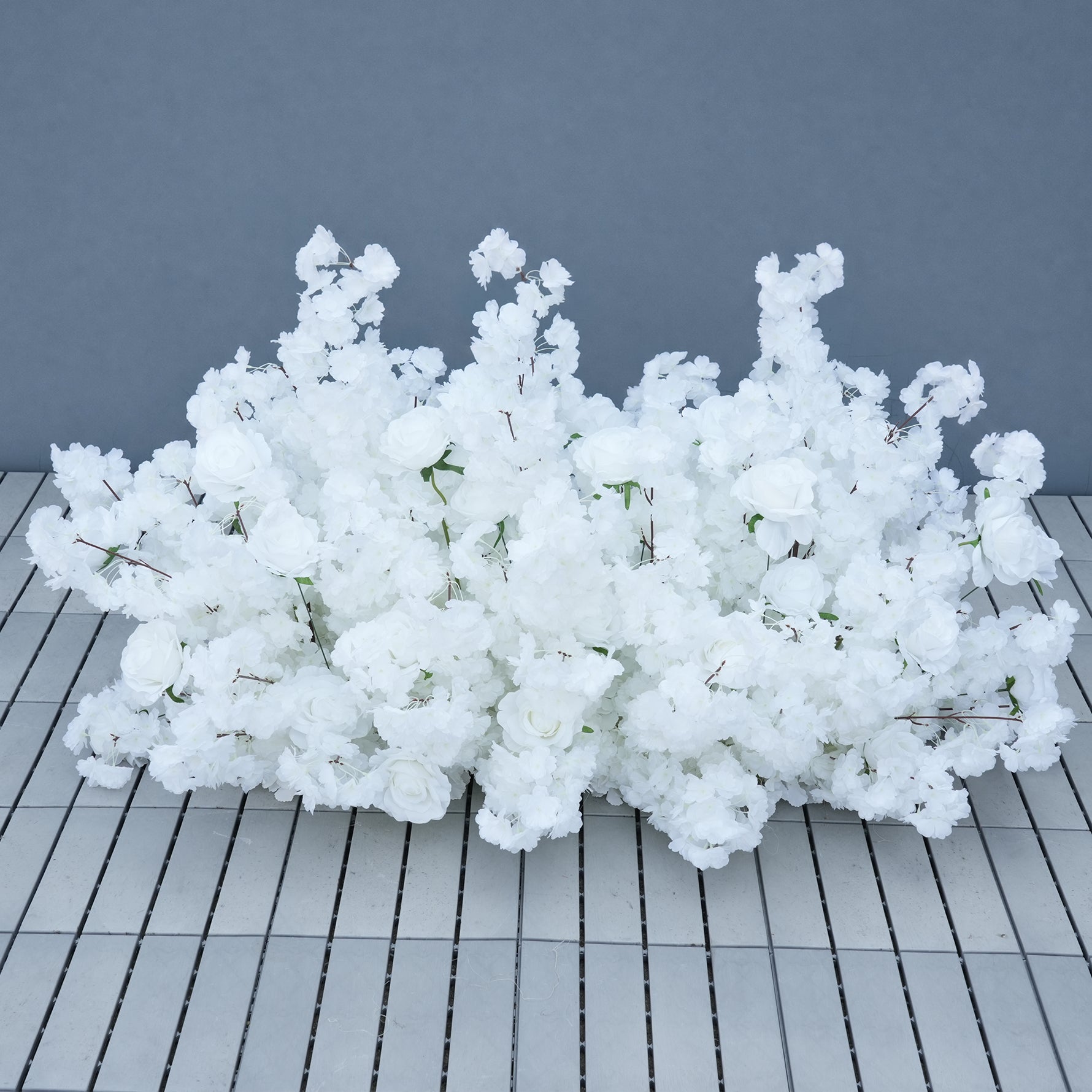 elegant all‑white backdrop for engagement ceremony