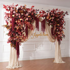 fall wedding arch floral arrangement burgundy
