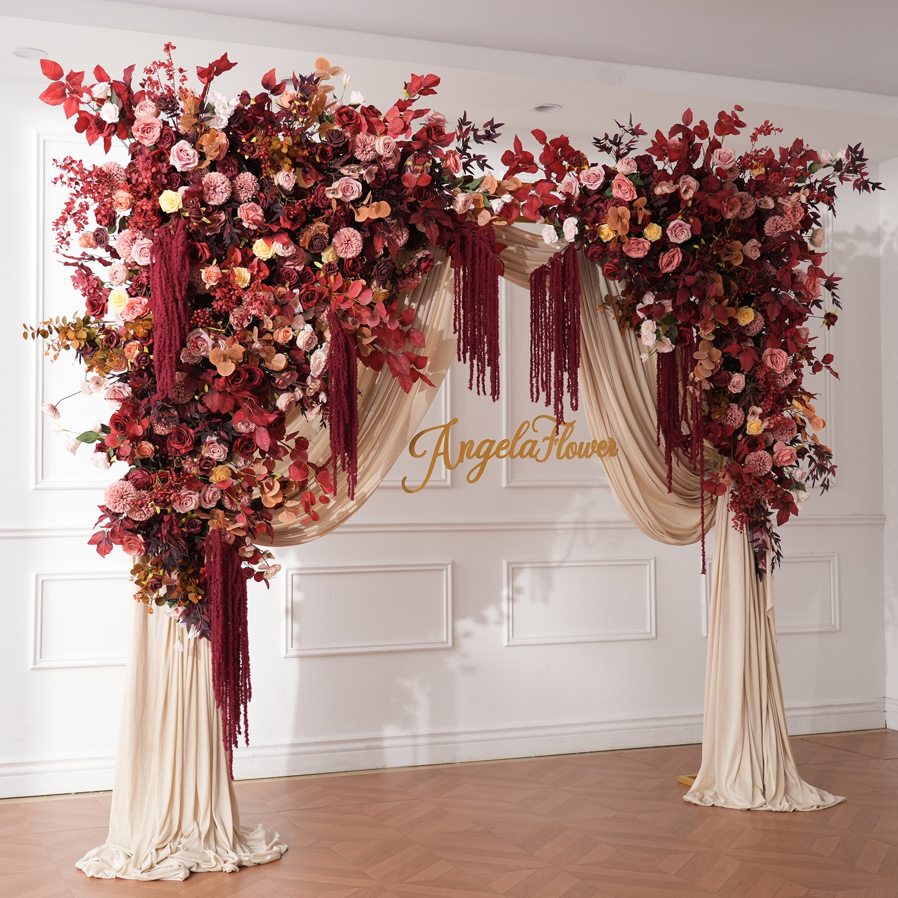 fall wedding arch floral arrangement burgundy