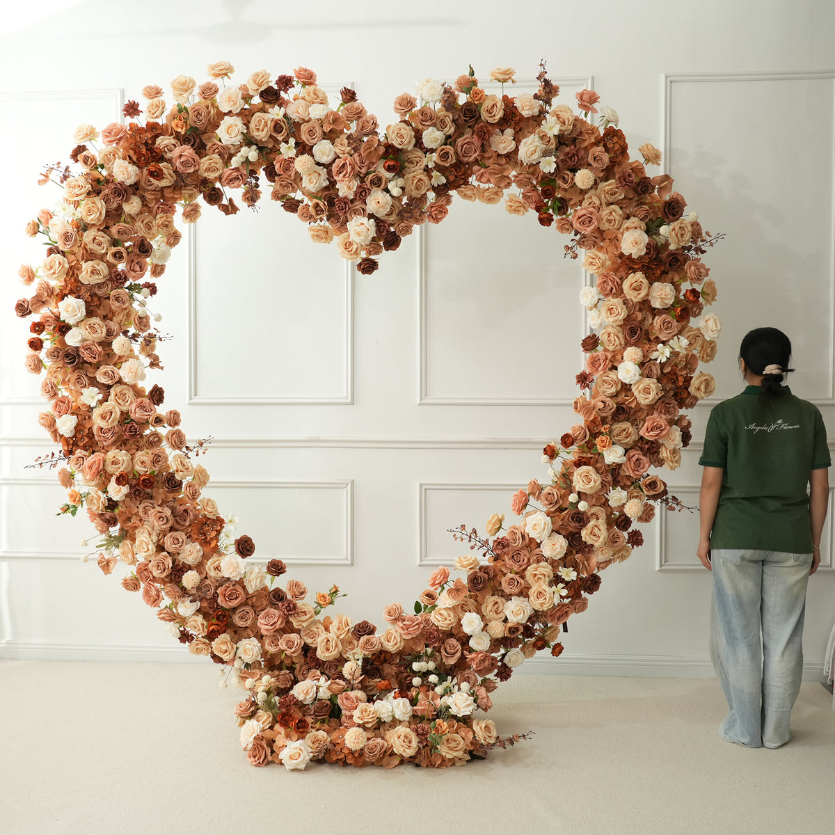 Warm earth tone heart flower arch outdoor wedding