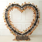 Taupe heart flower arch wedding ceremony decor