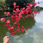 assorted‑color‑artificial‑orchid‑sprays‑event‑decor