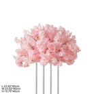 Blush pink flower sphere on banquet table with white linen