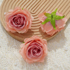 Blush pink artificial rose flower heads