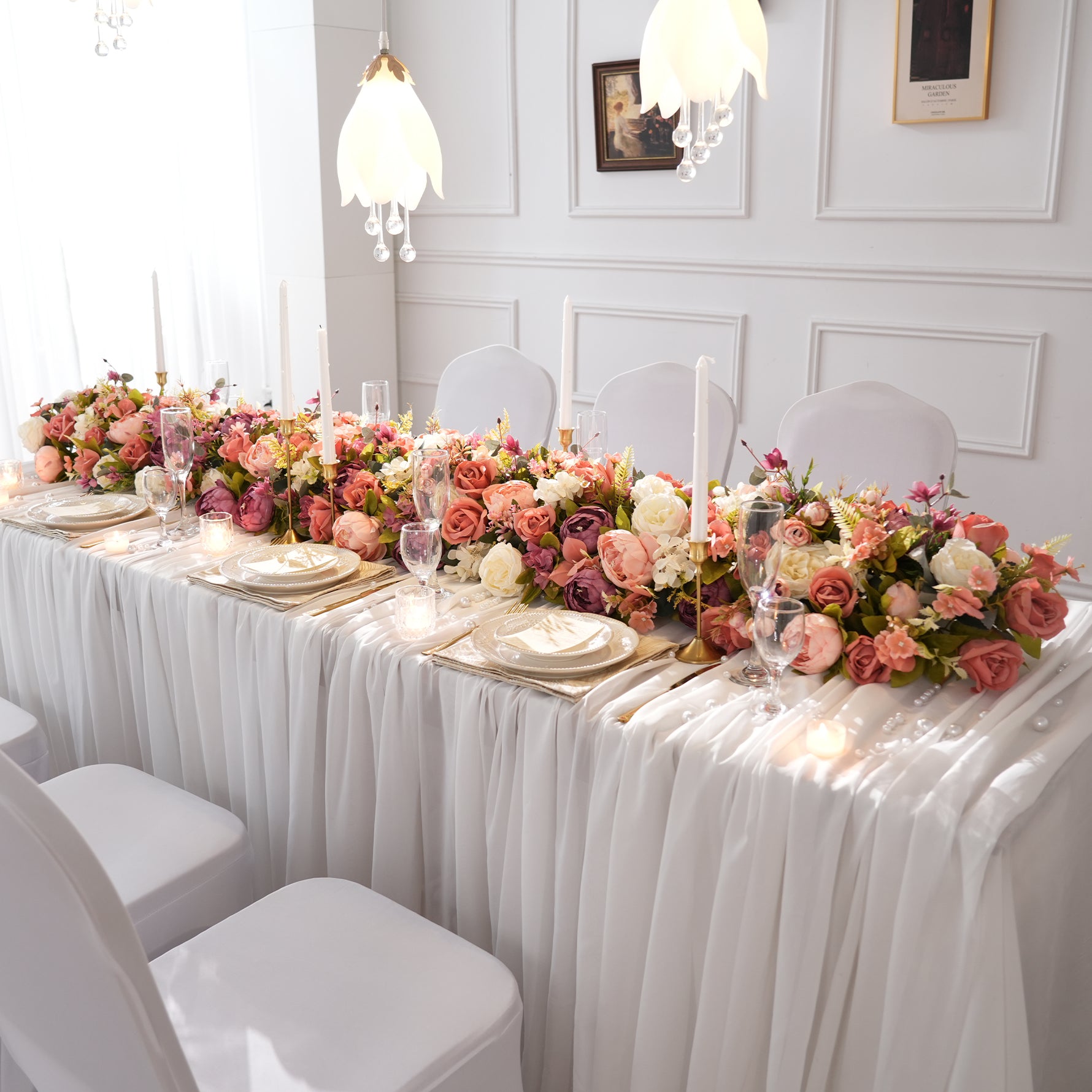 Outdoor garden wedding tablescape with mauve pink faux flower 