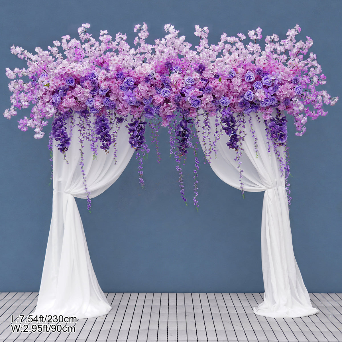 Pastel pink blossom flower arrangement for wedding arch
