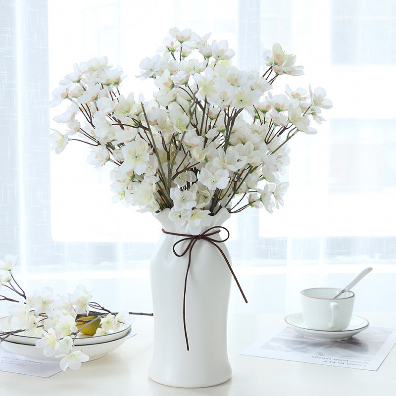 ivory_plum_branch_vase_display