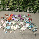 mixed‑tone-fake-clematis-floral-arrangement
