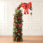 Farmhouse front yard christmas hoop arch with red rose flowers for winter party photo backdrop