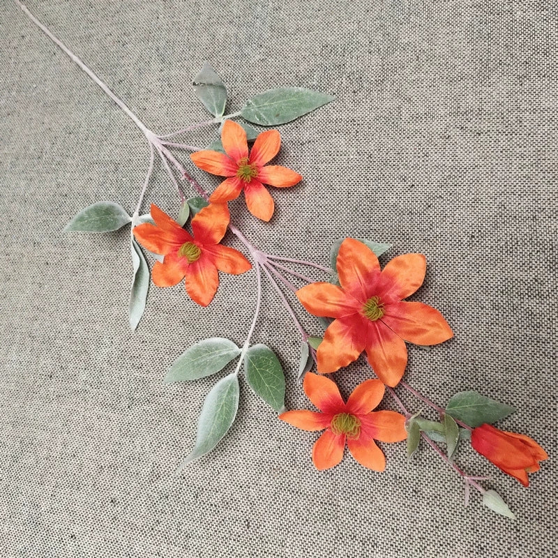 bright‑color-faux-clematis-indoor-decoration
