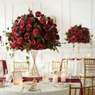 Elegant cascading fake floral table centerpiece with burgundy roses dahlia ivy, ideal for wedding and formal party decor