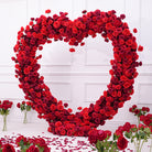 Reception heart shaped red flower arch
