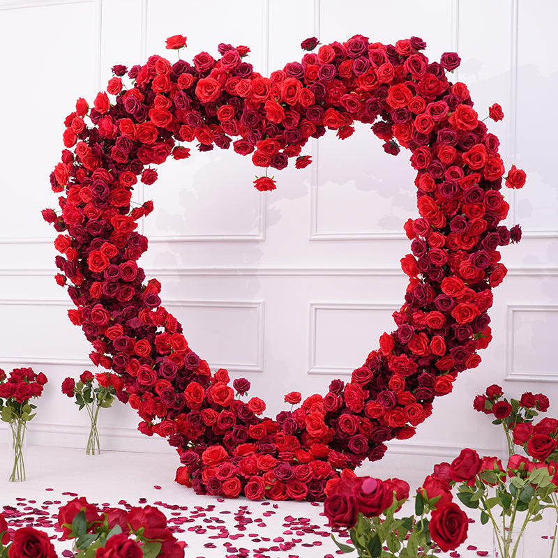 Reception heart shaped red flower arch