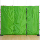 Mixed bloom flower wall panel with tropical green foliage