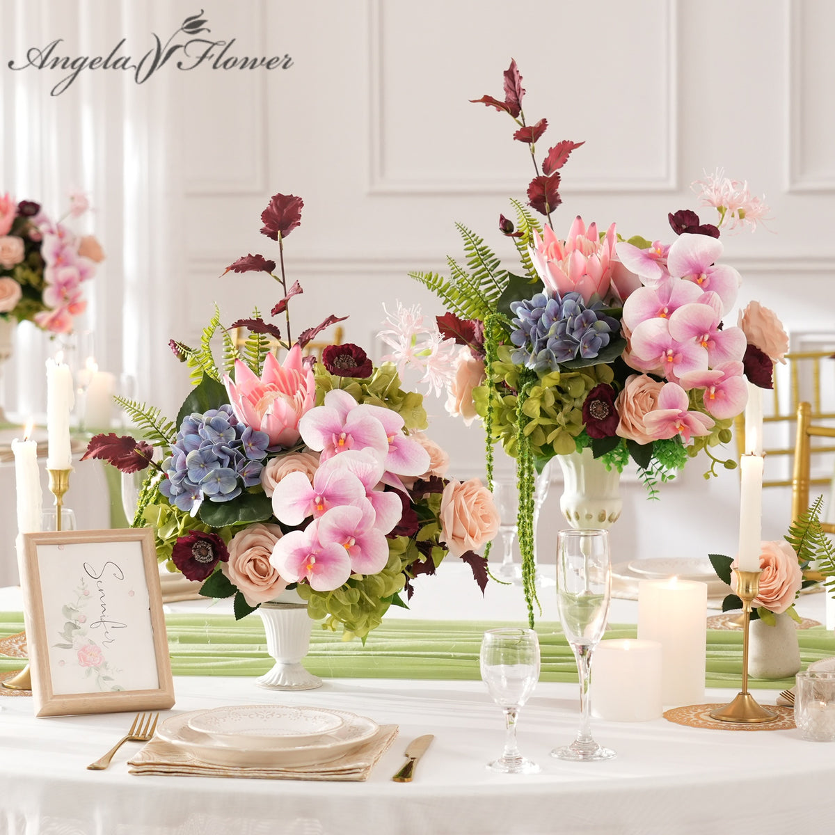 Protea and moth orchid wedding table centerpiece