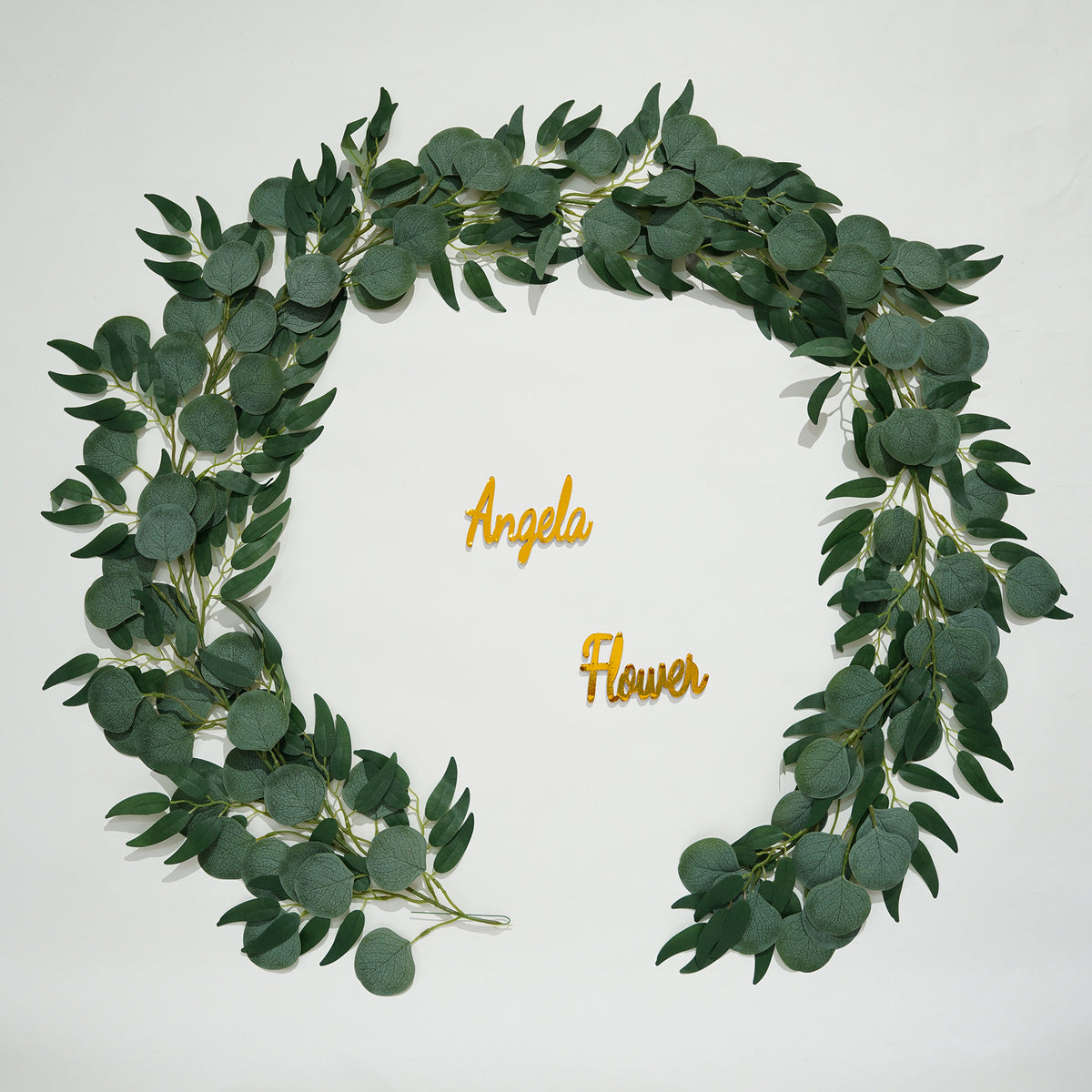Event hanging artificial eucalyptus vine photo booth backdrop