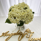 mauve faux hydrangea blooms for moody wedding
