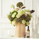 Blush pink hydrangea with pale anthurium accents
