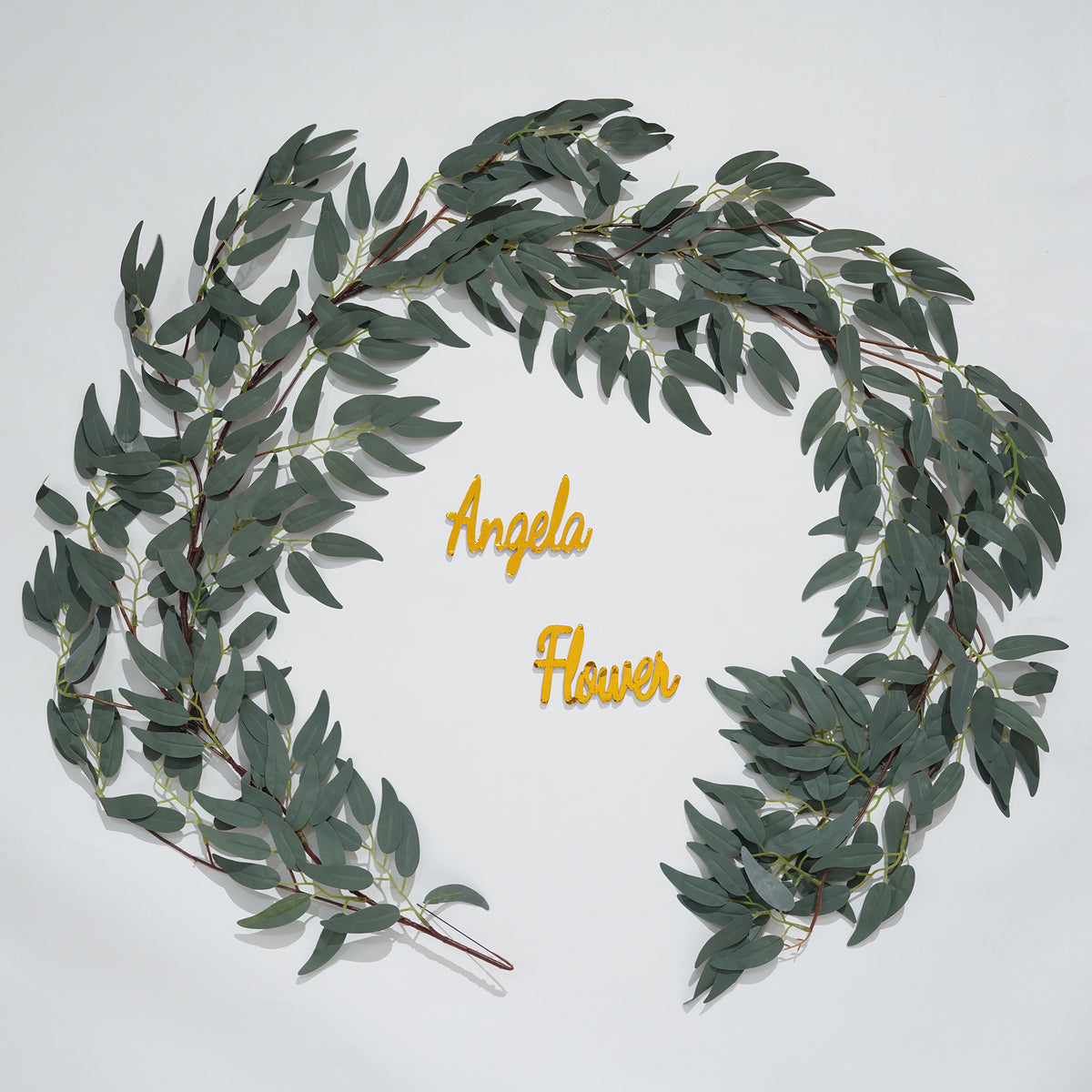 Soft green faux eucalyptus garland wedding table decor
