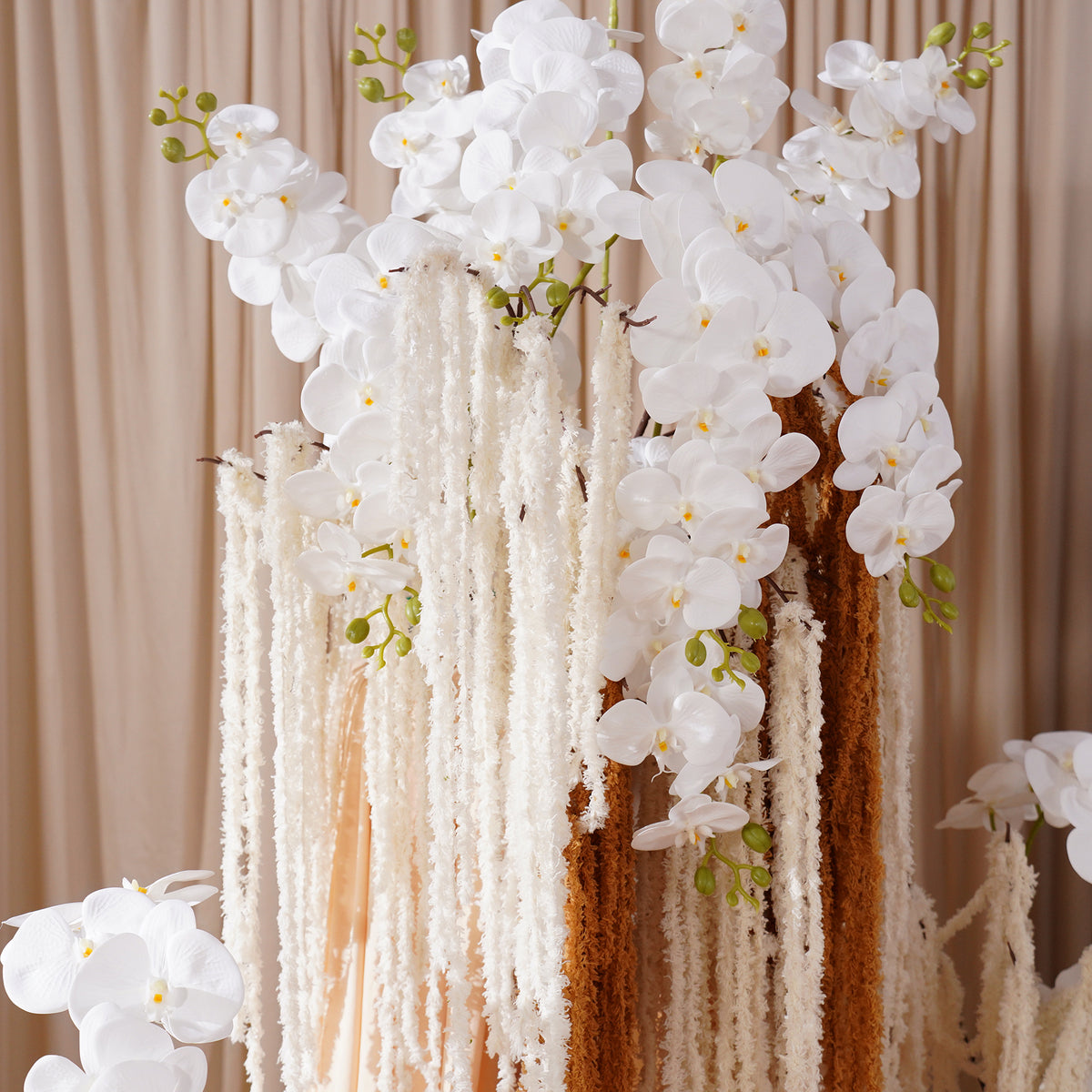 indoor backdrop silk flower installation neutral earth tone wedding flowers