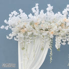 Raspberry wisteria hanging arrangement for event stage