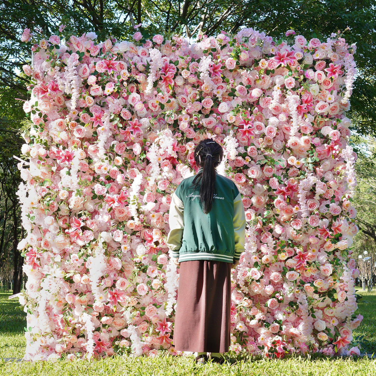 Standing installed flower wall mixed with roses and wisteria for  bridal shower decoration