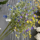 Yellow artificial daisy stem for spring event styling