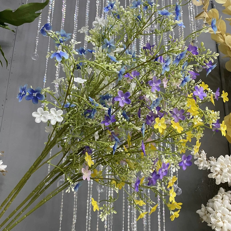 Yellow artificial daisy stem for spring event styling