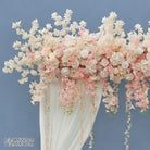 Soft white wisteria hanging swag for wedding backdrop