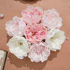 Faux peony blooms for wedding backdrop