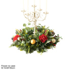 Faux evergreen sprigs, eucalyptus leaves, red roses and red berry clusters for christmas decor