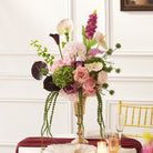 Green hydrangea mixed flower table centerpiece with trailing green stems