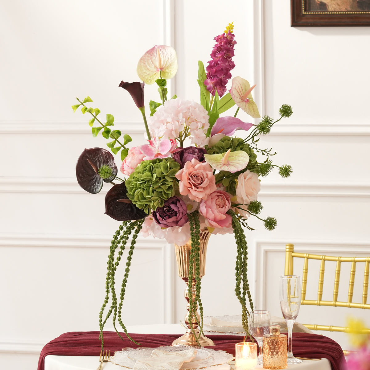 Green hydrangea mixed flower table centerpiece with trailing green stems