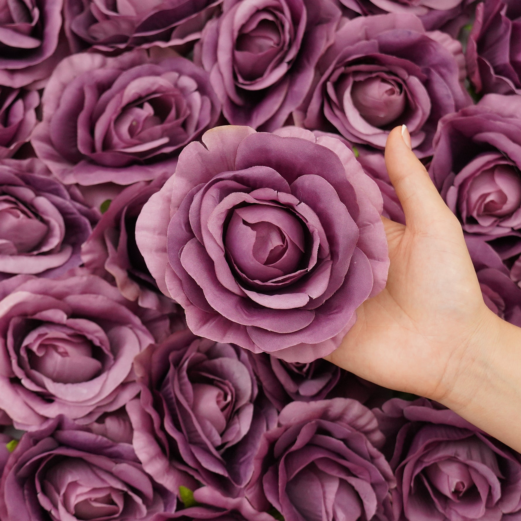 Mixed shade artificial rose blooms for professional flower design