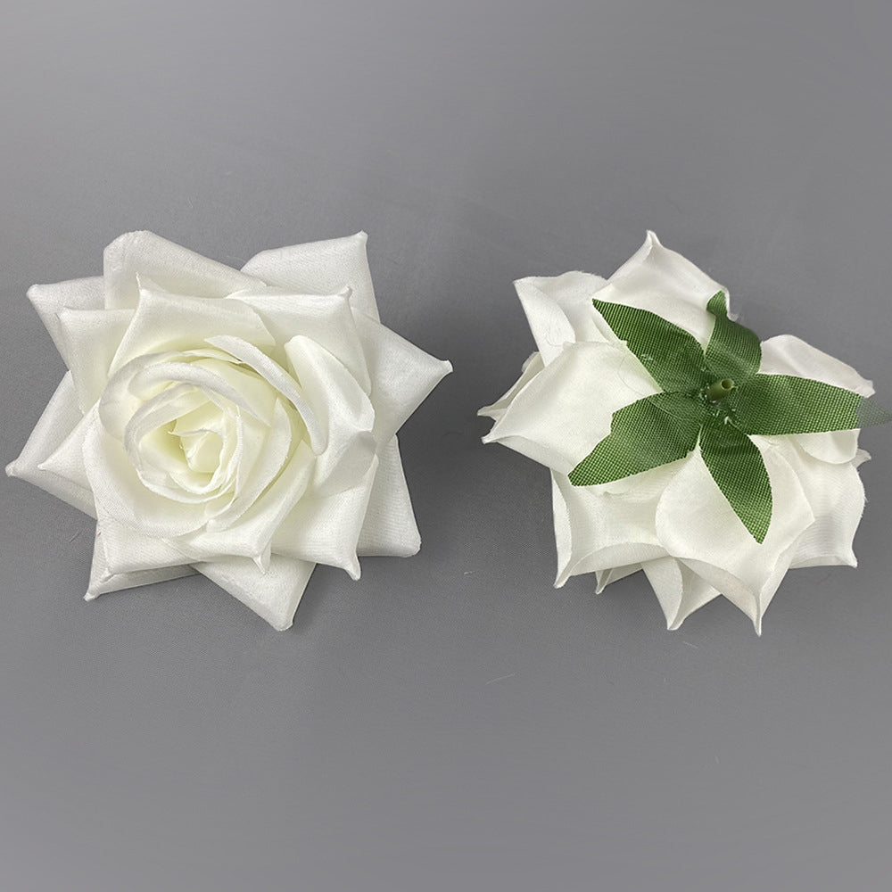 Mixed color artificial rose heads flat lay swatch