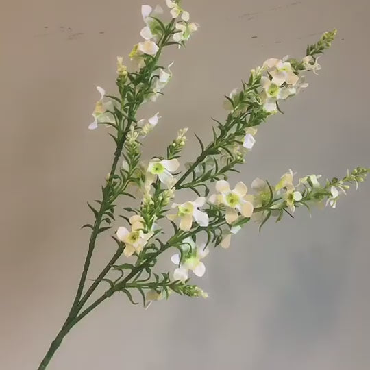 white_faux_flower_branch