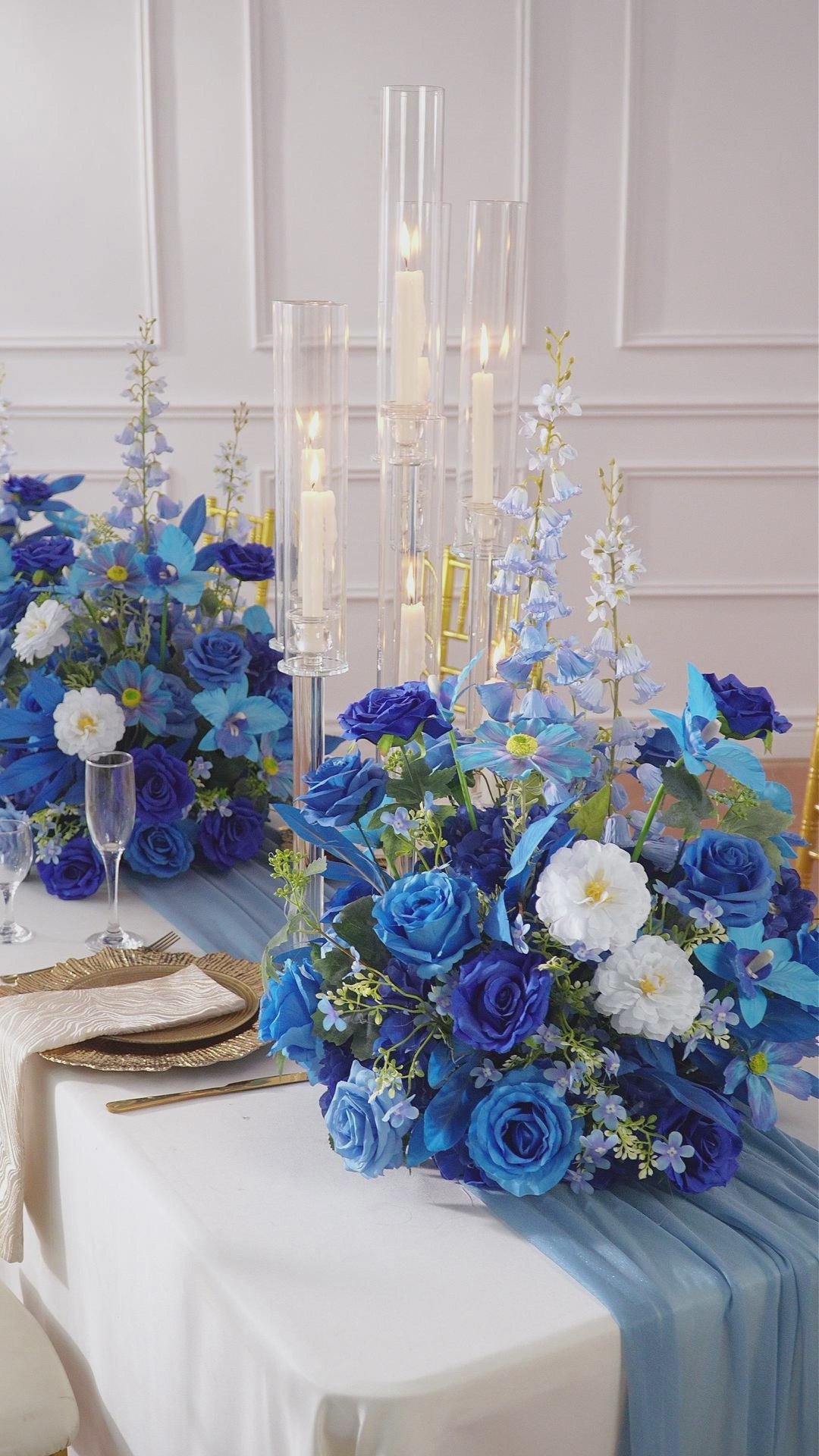 Pale blue wildflower mix table centerpiece for romantic wedding decor