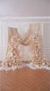 blush faux rose aisle flower arrangement