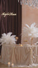 Wedding table centerpiece with natural white ostrich plumes
