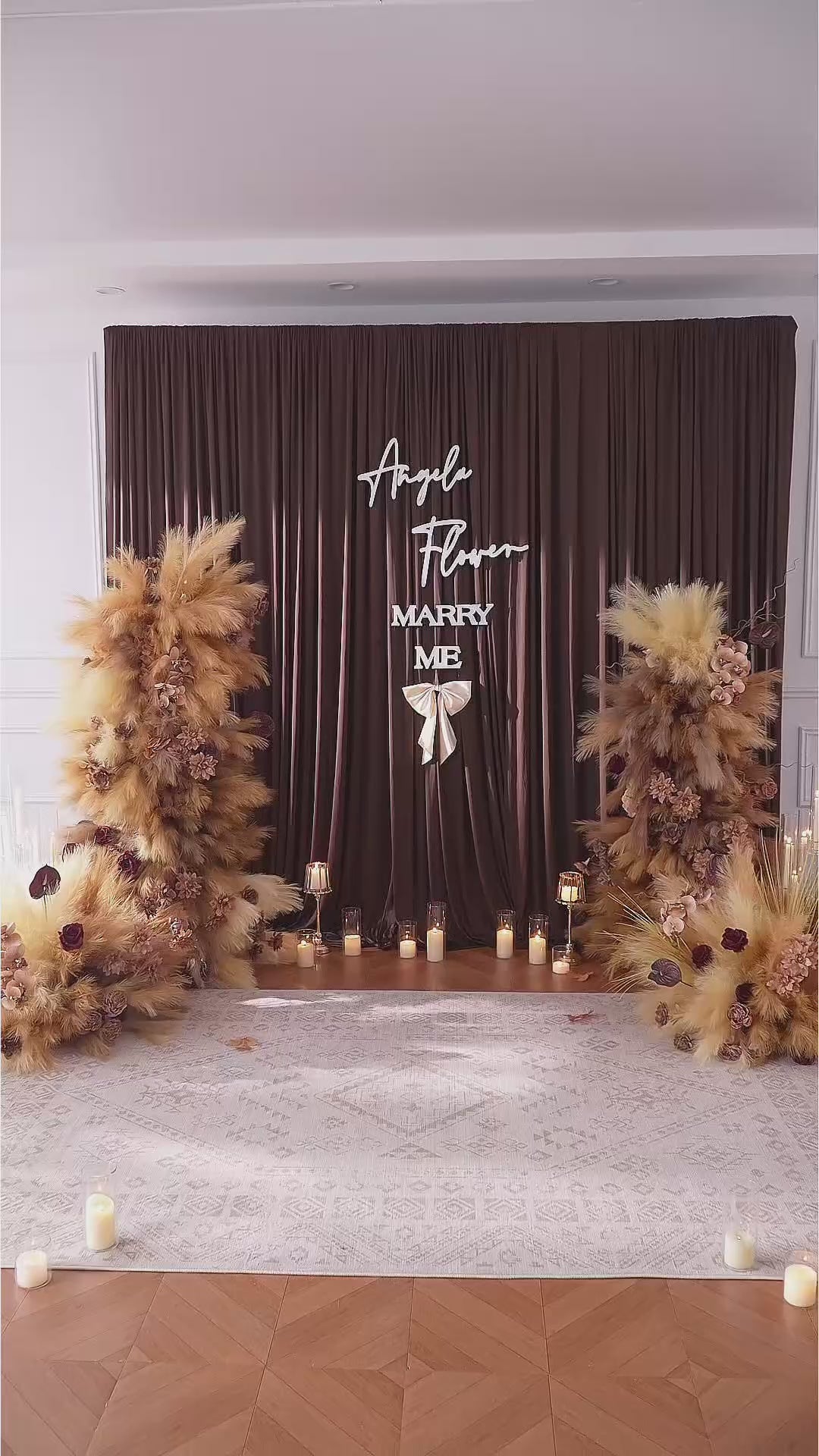 Faux boho pampas grass pillar flower arrangement
