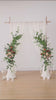 faux-terracotta-rose-arch-corner-flowers
