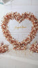 Mocha brown heart floral arch for event styling