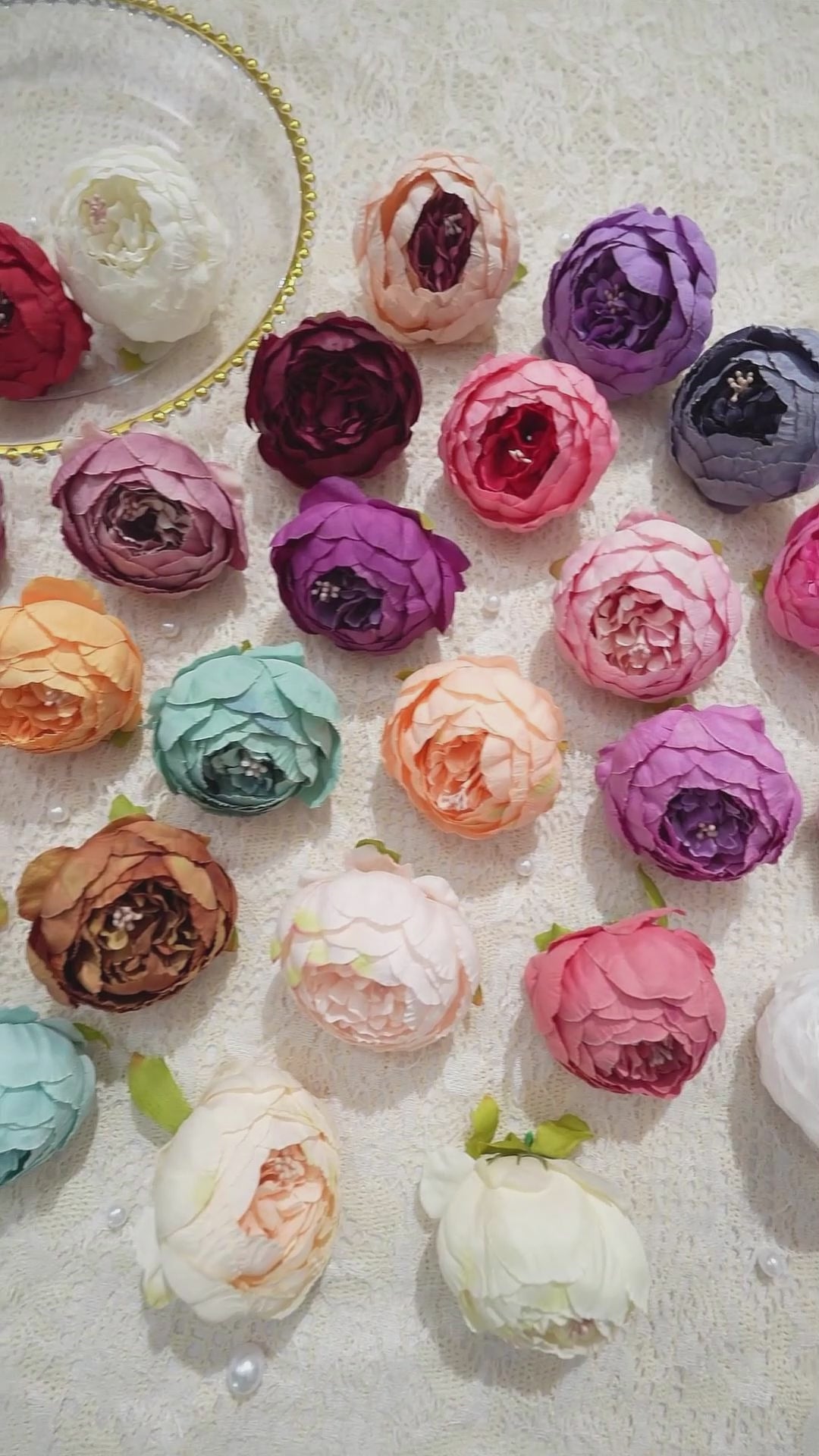 Burgundy silk ranunculus blooms for wedding decor
