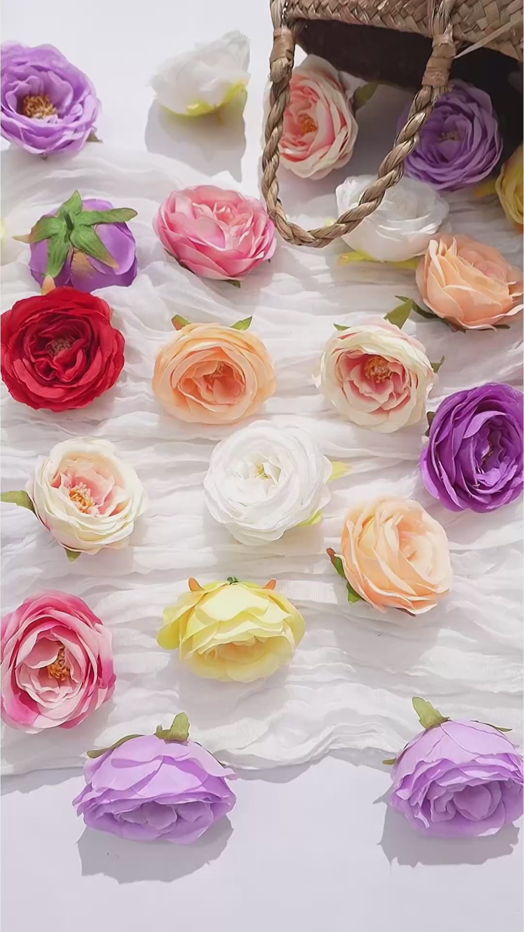 Faux rose blooms flat lay assorted colors photo