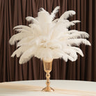 Gatsby party table styling with white ostrich feather decor