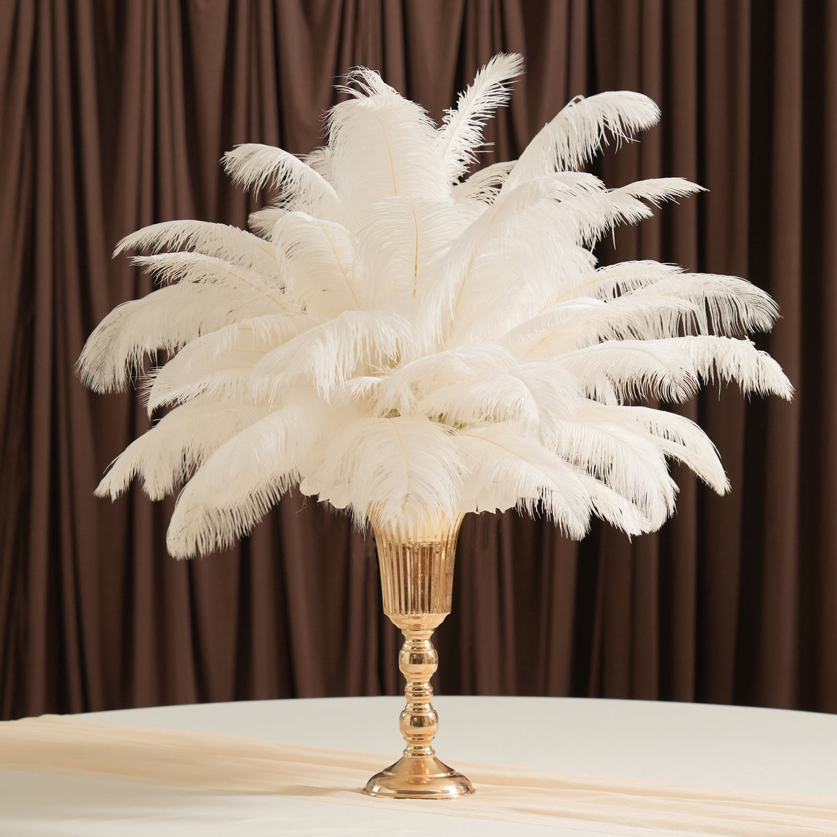 Gatsby party table styling with white ostrich feather decor