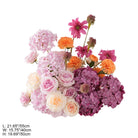 Matching table flowers for seaside wedding arch backdrop
