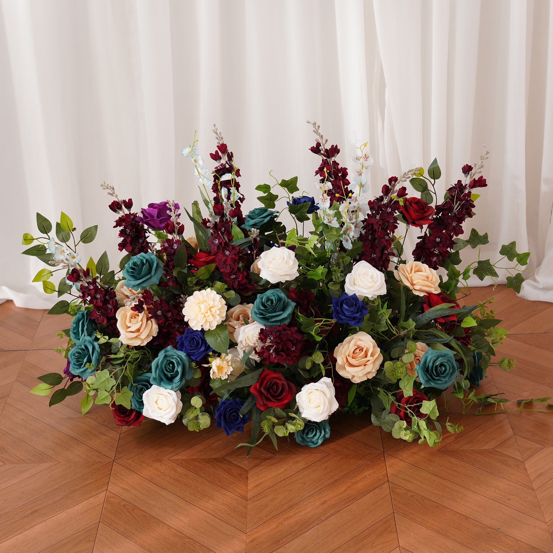 large-floral-arch-with-roses-and-hanging-greenery